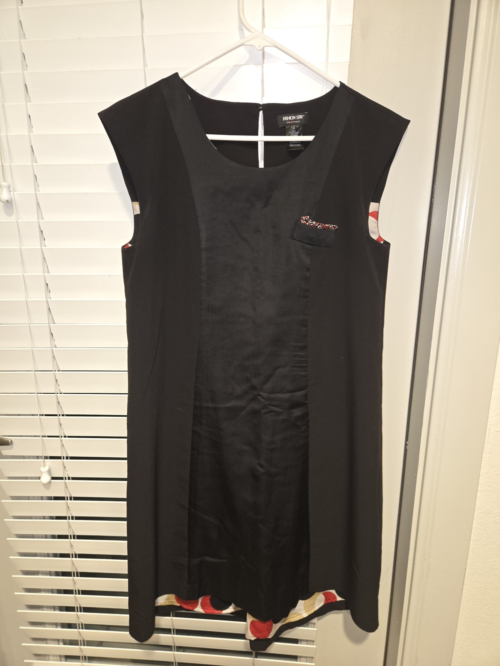 Black Sleeveless Shift Dress with Scallop Hem Detail